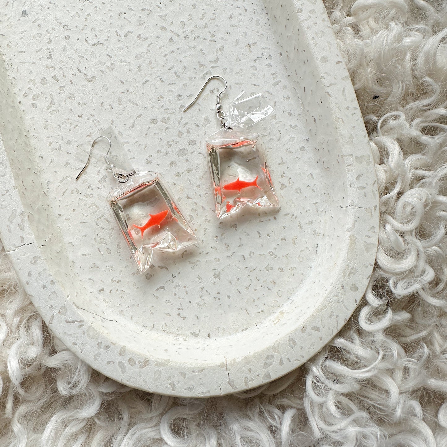 Fish in a bag earrings