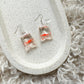 Fish in a bag earrings